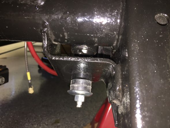 Lower End Of Shock Loosely Mounted to Axle Bracket